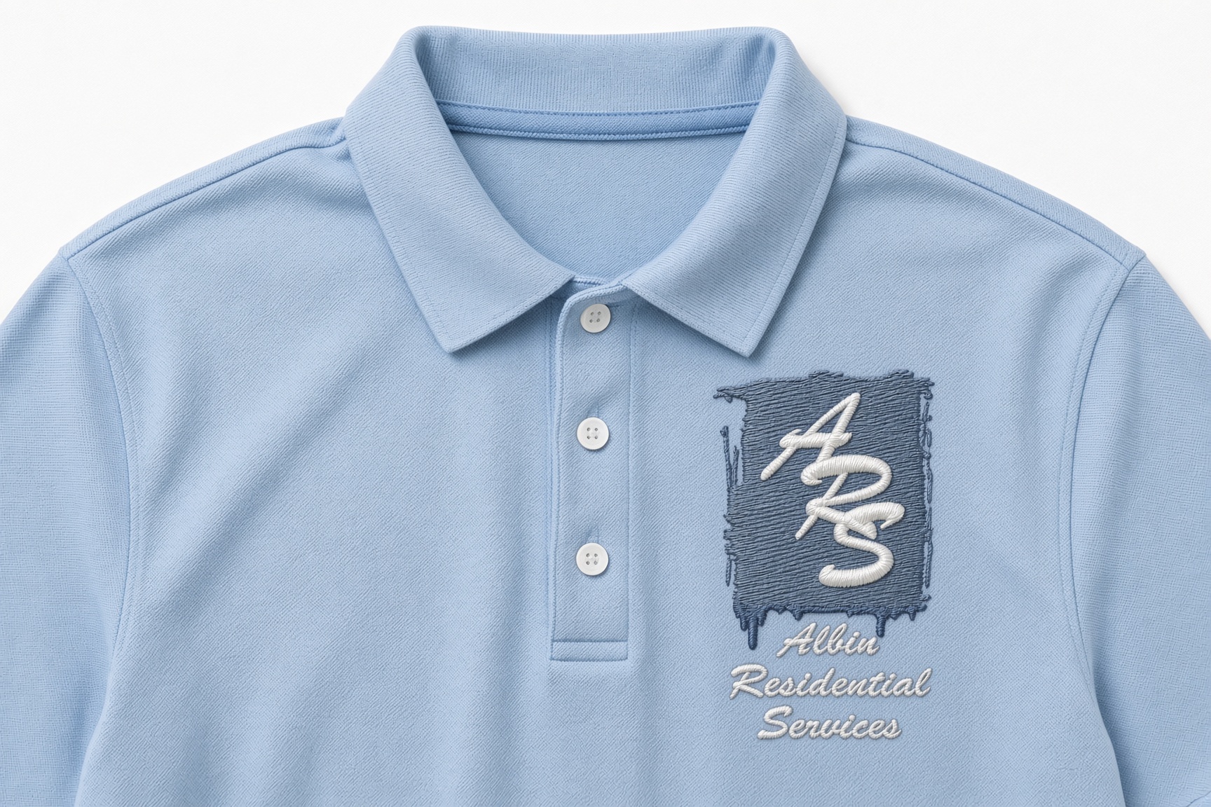 Light blue polo with embroidered ARS Albin Residential Services logo on the left chest
